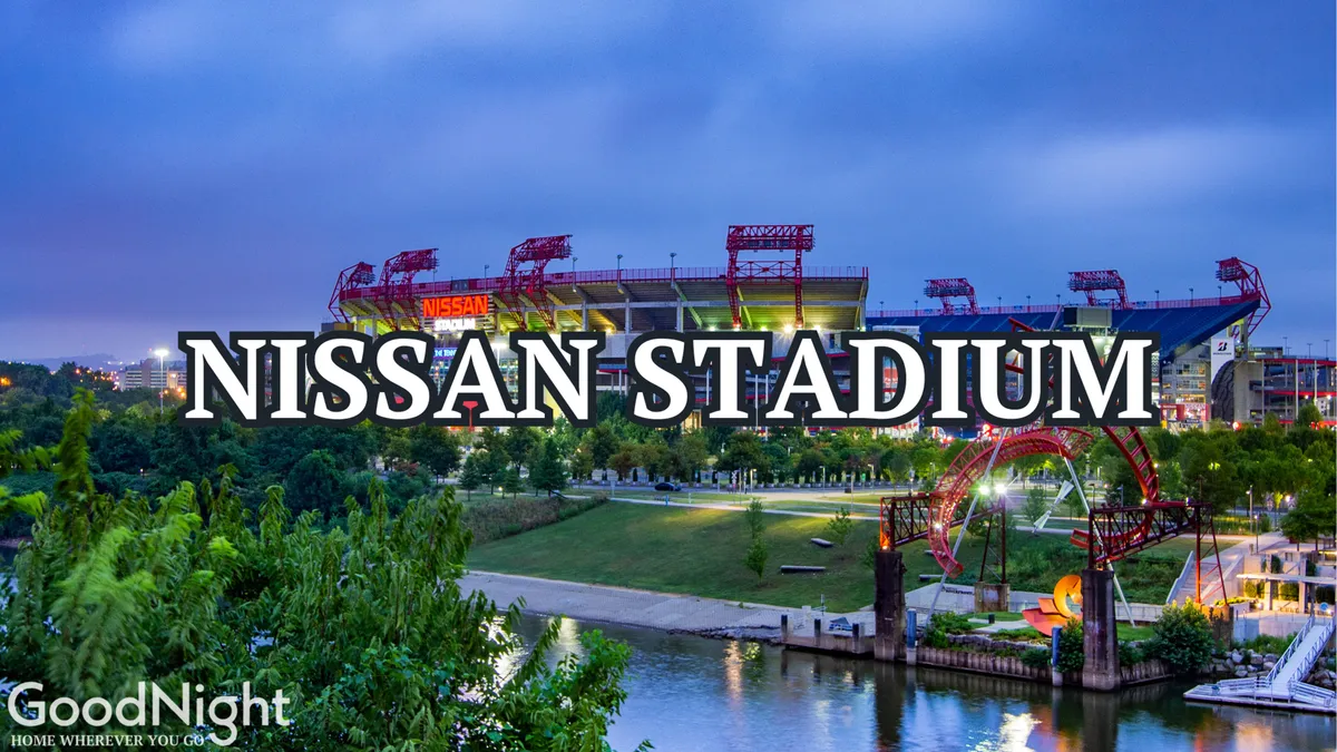 A vibrant exterior scene featuring the Nissan Stadium along the river, a park area, and the Nashville skyline at sunset. People are seen walking or jogging along the river, and others are picnicking in the park, suggesting lively urban exploration and access to city attractions.